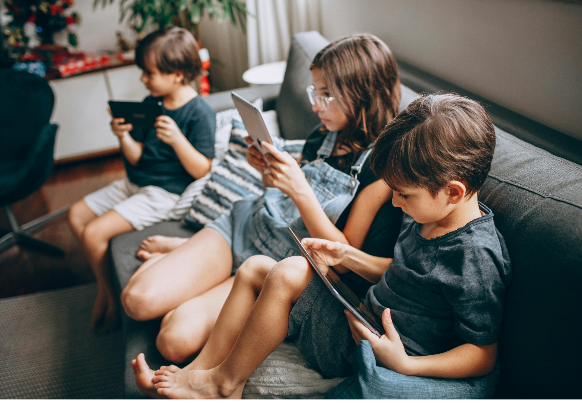 Children on tablets and devices at home